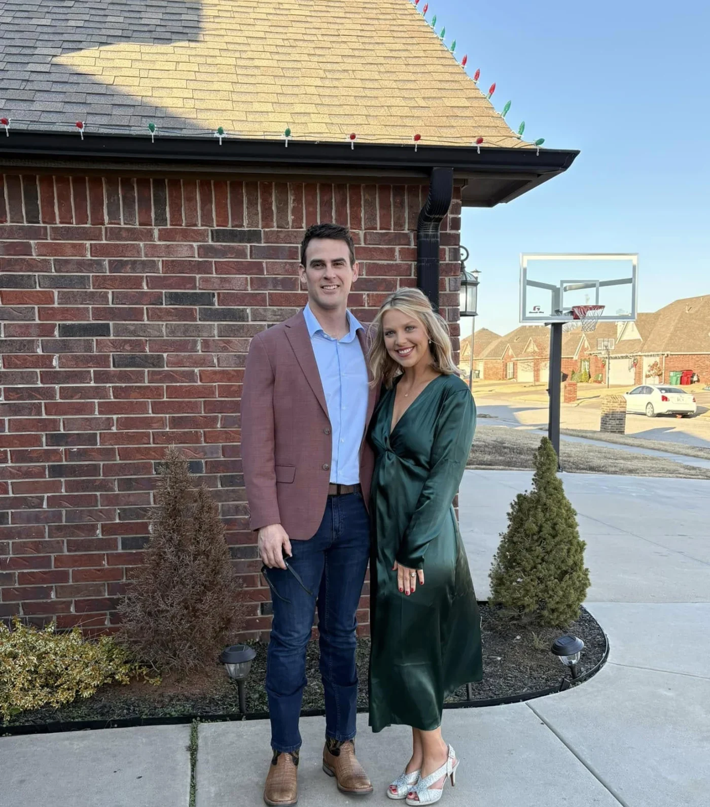 Harrison and his wife take a photo together